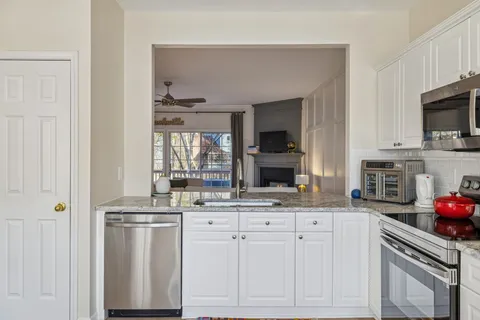 a view of walk in closet with window