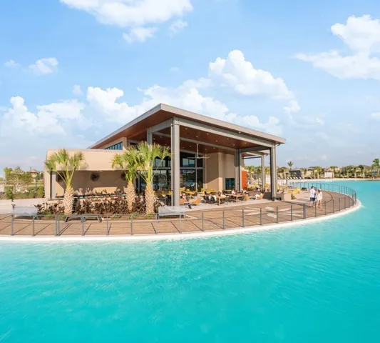 a view of a house with backyard porch and patio