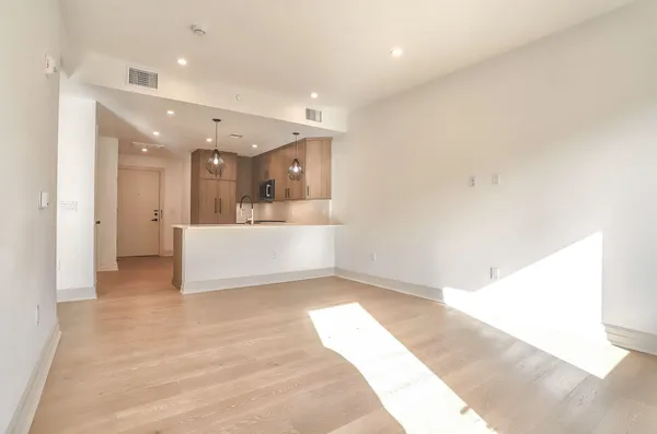 a view of a kitchen with a sink