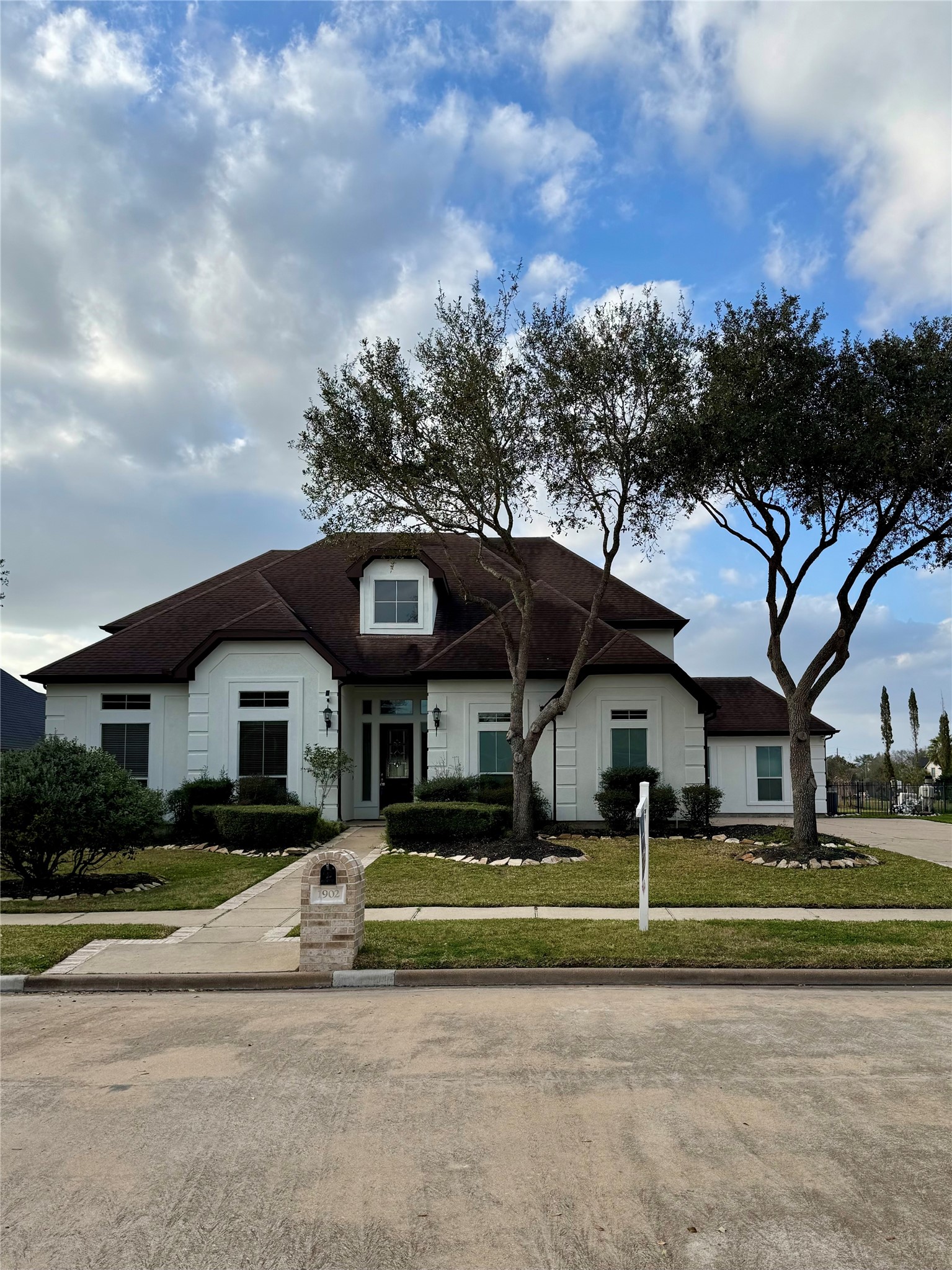 1902 Sparrows Ridge Katy, TX 77450 - Photo 3 of 48 a front view of a house with a yard