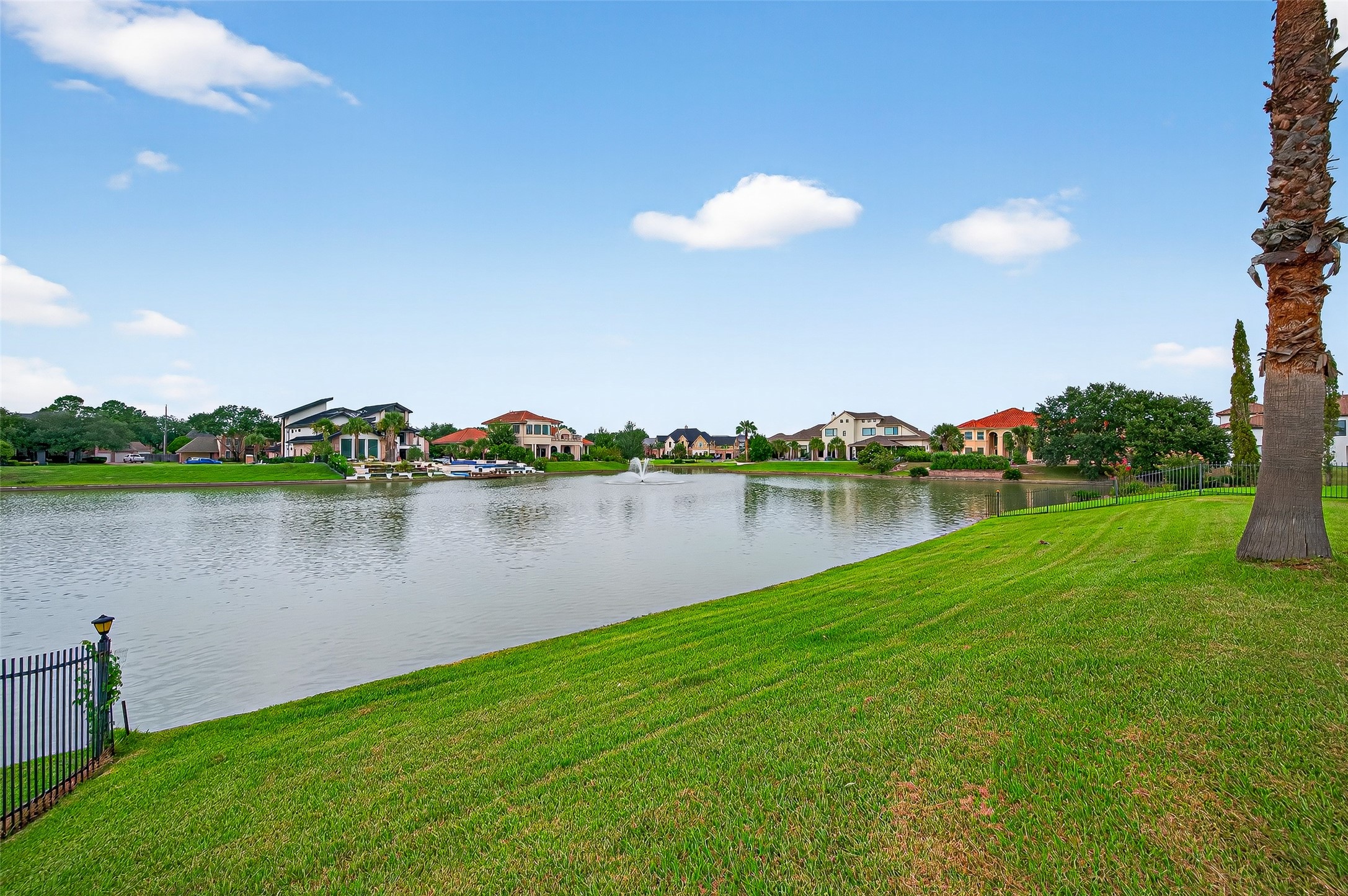 1902 Sparrows Ridge Katy, TX 77450 - Photo 36 of 48 a view of a lake with houses in the back