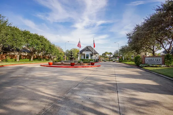 a view of a play ground in front of a house
