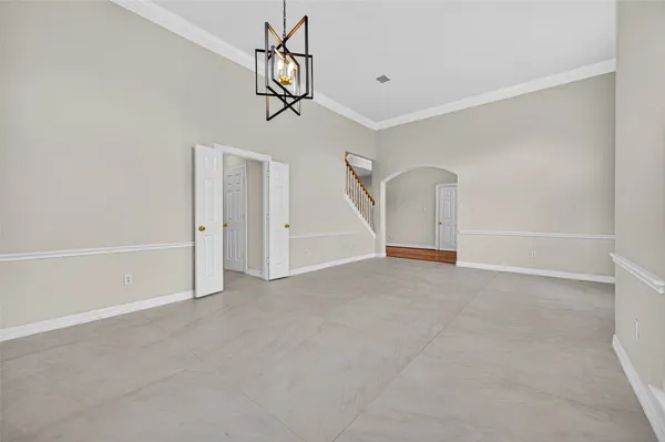a view of empty room with windows