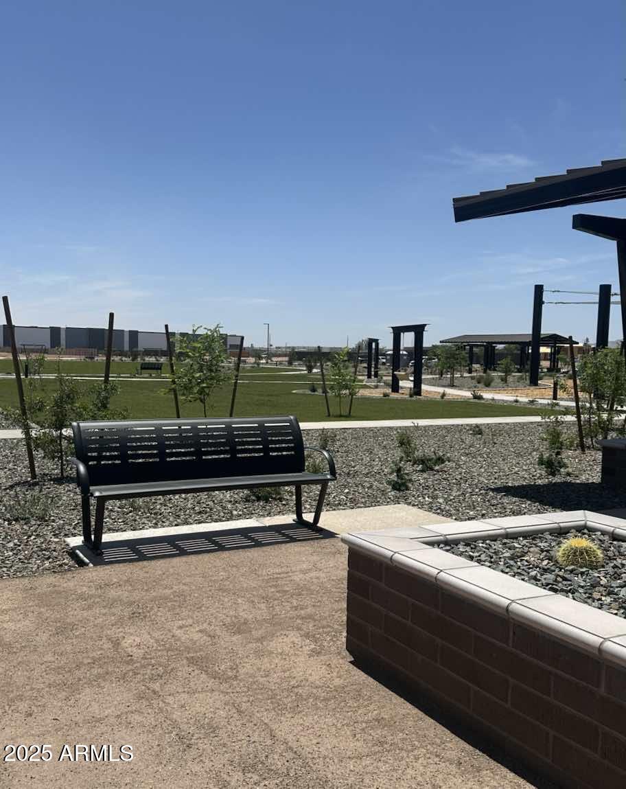 10374 North 156th Avenue Waddell, AZ 85355 - Photo 2 of 17 a view of a bench in the terrace