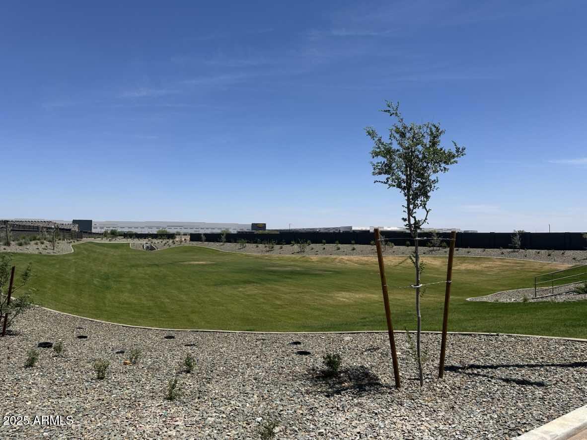 10374 North 156th Avenue Waddell, AZ 85355 - Photo 4 of 17 a view of a lake with a outdoor space