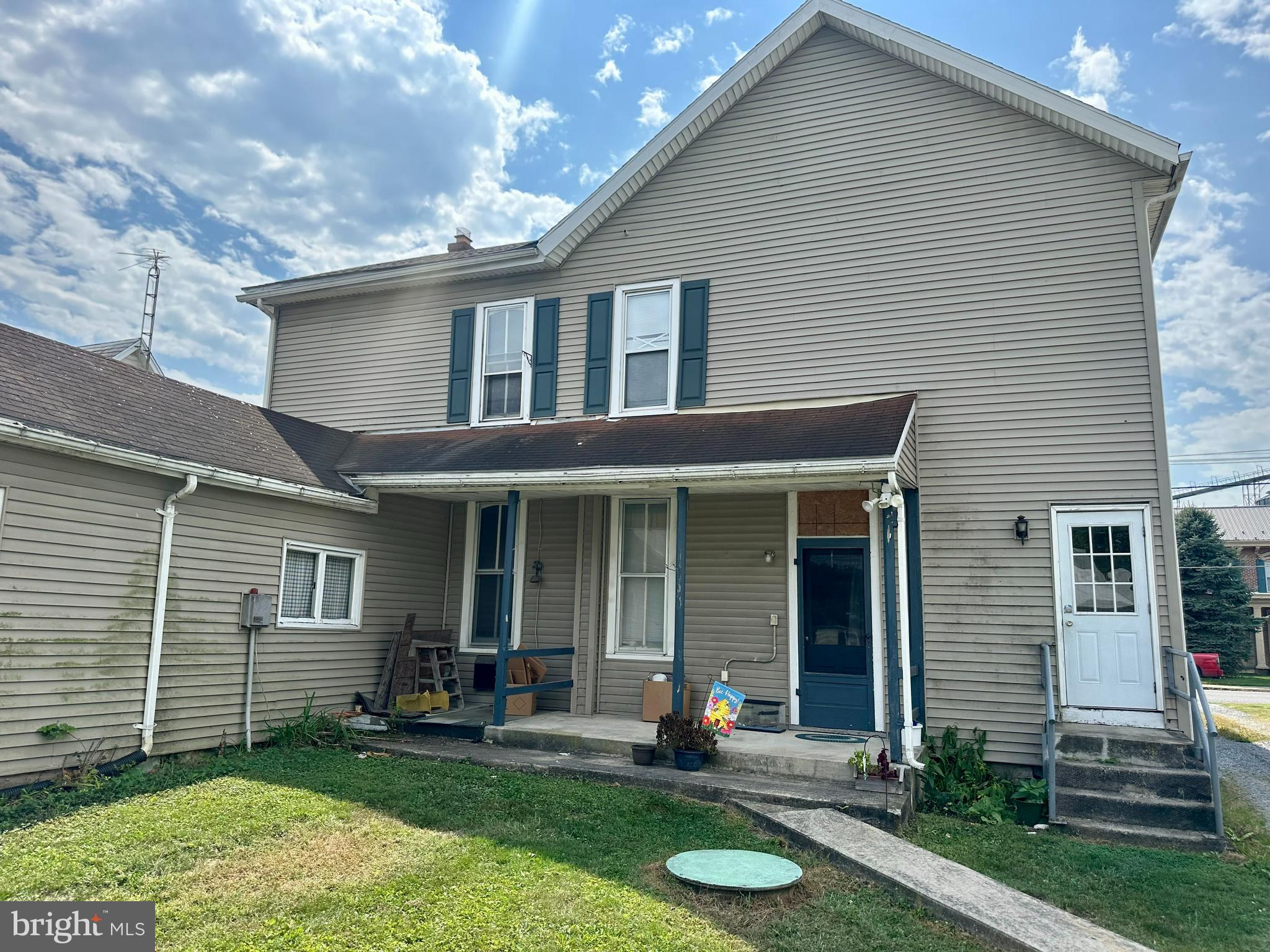 4576 Lemar Road, Unit 2A Mercersburg, PA 17236 - Photo 2 of 12 a view of a house with a yard and sitting area