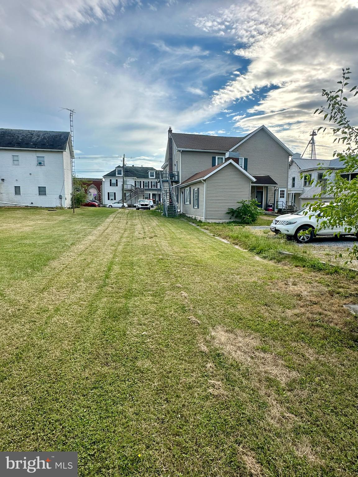 4576 Lemar Road, Unit 2A Mercersburg, PA 17236 - Photo 3 of 12 a house view with a garden space