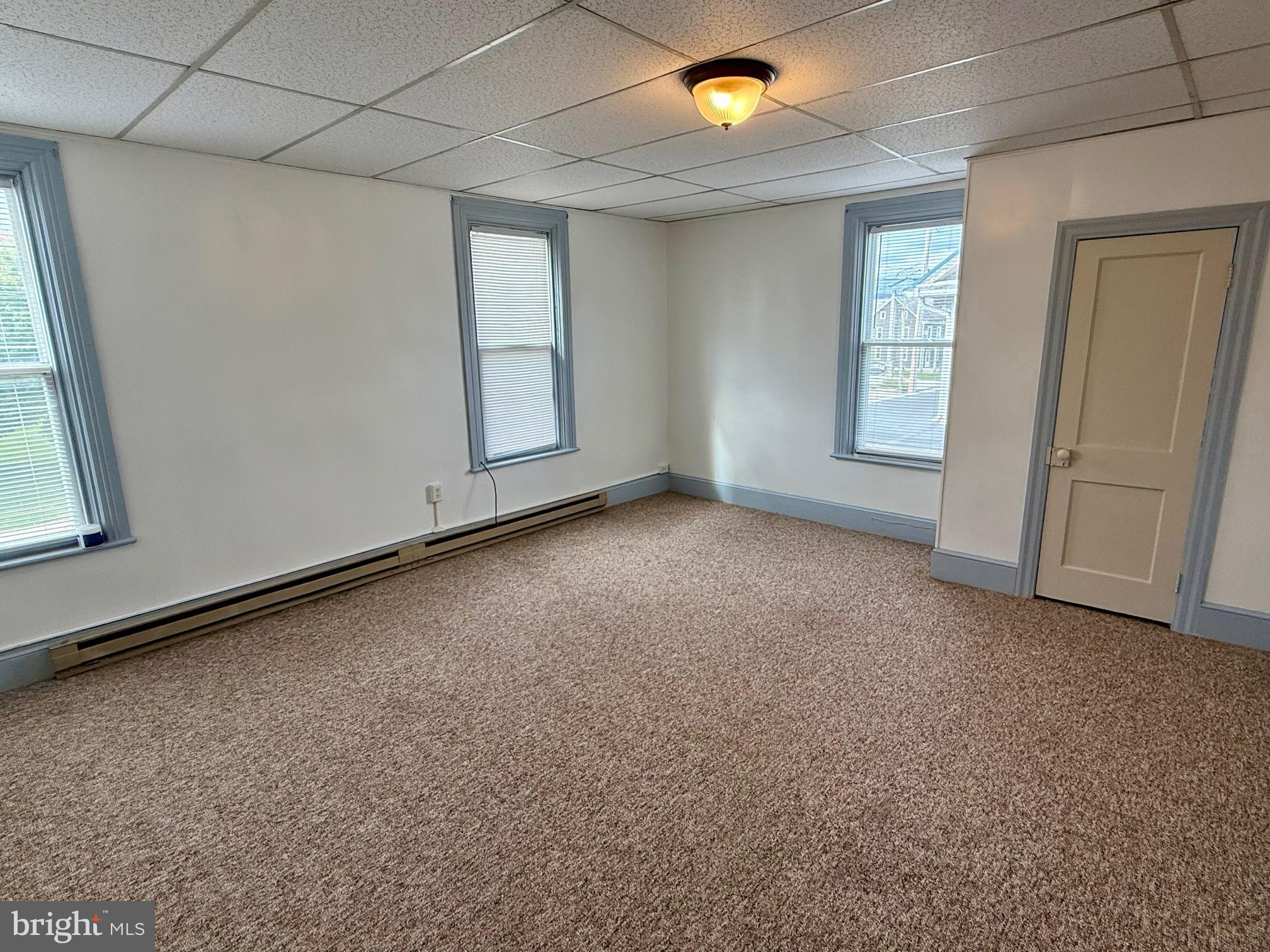 4576 Lemar Road, Unit 2A Mercersburg, PA 17236 - Photo 9 of 12 an empty room with windows