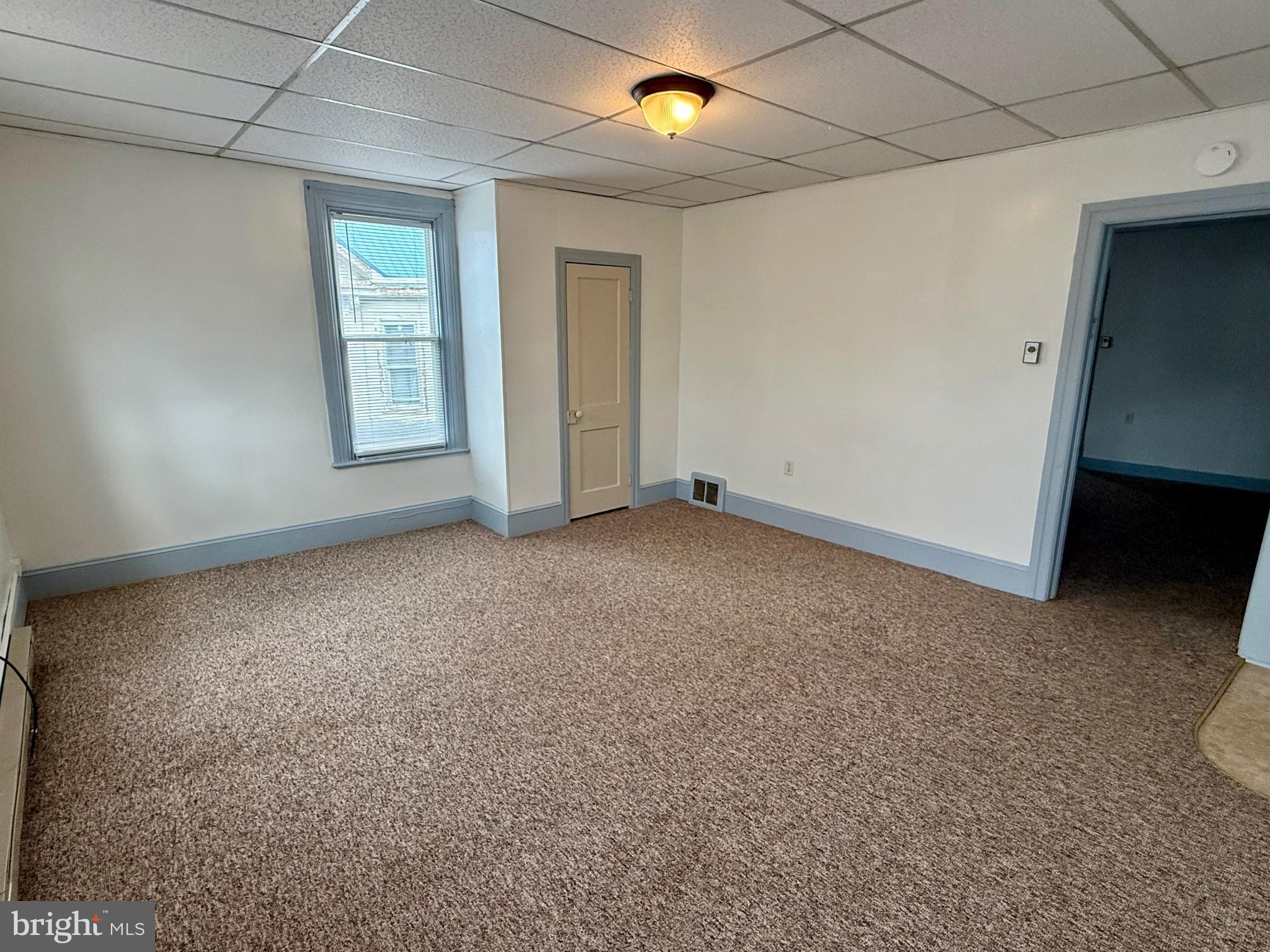 4576 Lemar Road, Unit 2A Mercersburg, PA 17236 - Photo 10 of 12 an empty room with windows
