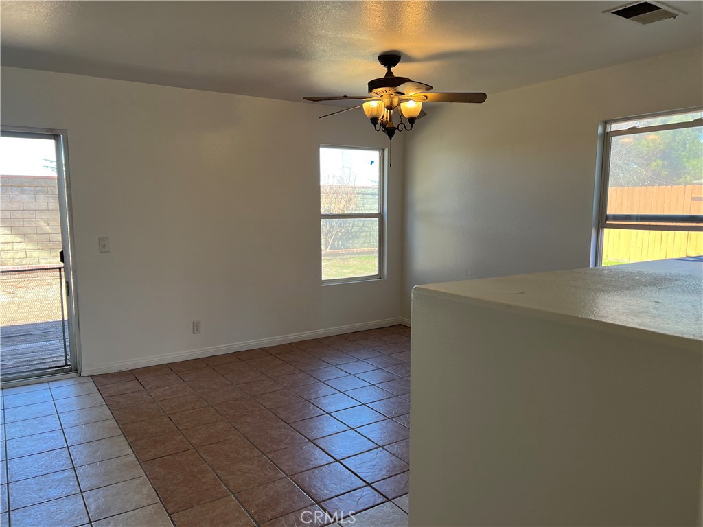 40305 Reata Road Palmdale, CA 93550 - Photo 4 of 20 an empty room with windows