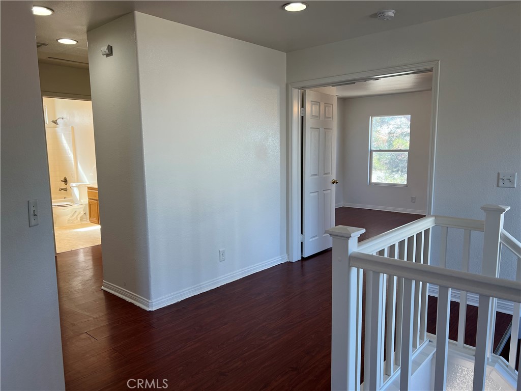 40305 Reata Road Palmdale, CA 93550 - Photo 8 of 20 a view of an entryway door with a window