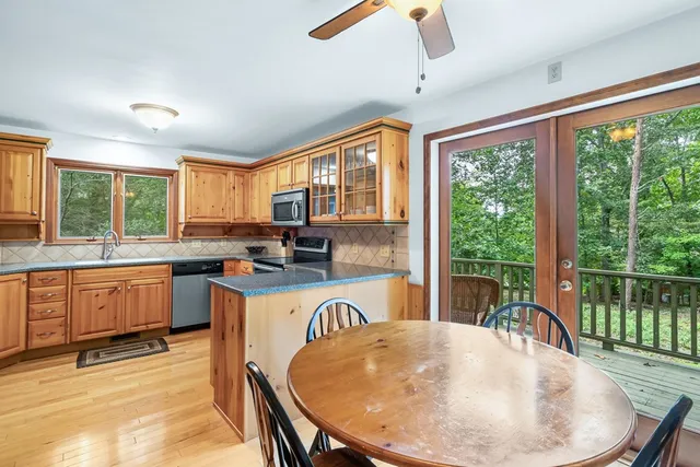 a very nice looking kitchen with a large window