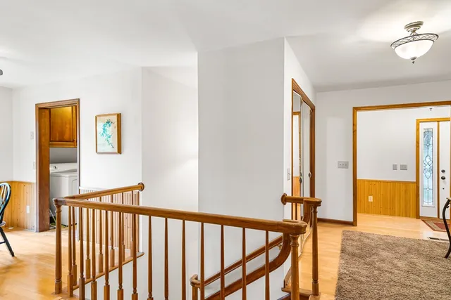 a view of a hallway with windows