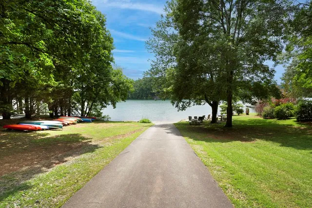 a view of a swimming pool with a bench