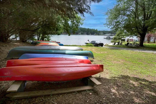 a view of a yard with table and chairs