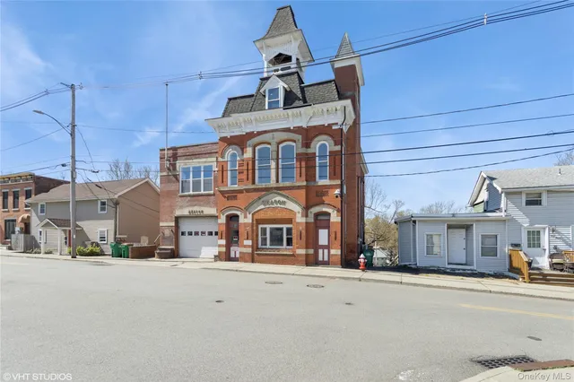 a front view of a building with street
