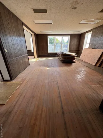 a kitchen with stainless steel appliances a stove a refrigerator a sink and a refrigerator