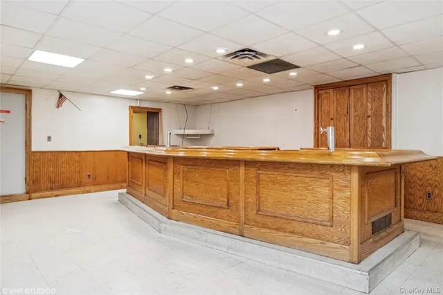 a view of a terrace with a table and chairs