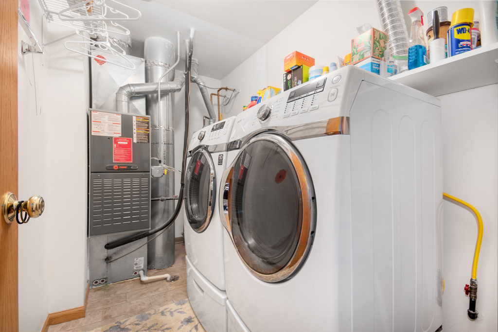 1070 Clover Drive Minooka, IL 60447 - Photo 13 of 15 a utility room with dryer and washer