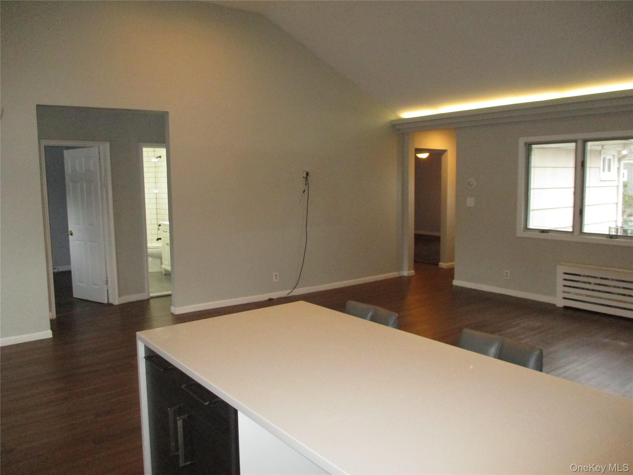 99 North Strathmore Street Valley Stream, NY 11581 - Photo 5 of 12 a bedroom with a bed and a dresser