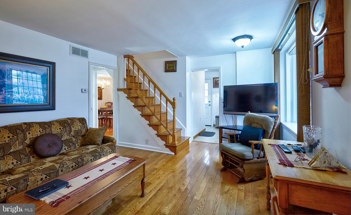 813 Columbus Road Burlington, NJ 08016 - Photo 7 of 26 a living room with furniture and a flat screen tv