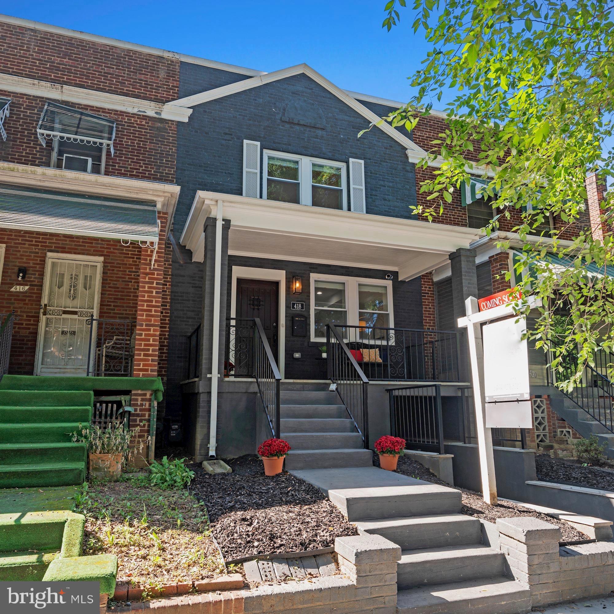 418 21st Street Northeast Washington, DC 20002 - Photo 1 of 48 a front view of a house with garden