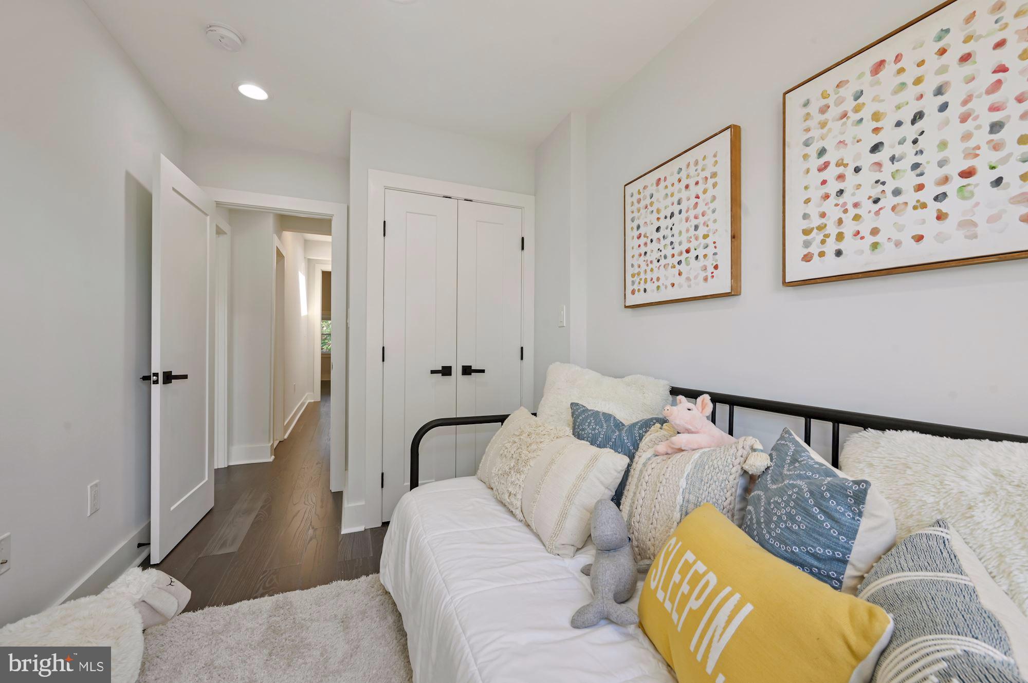 418 21st Street Northeast Washington, DC 20002 - Photo 24 of 48 a living room with furniture and a wooden floor