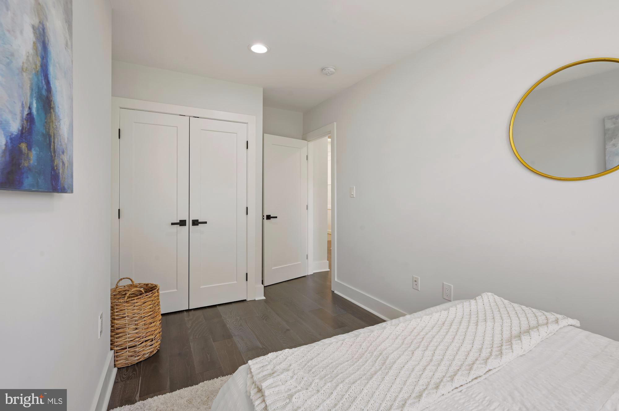 418 21st Street Northeast Washington, DC 20002 - Photo 27 of 48 a bedroom with a bed and a potted plant