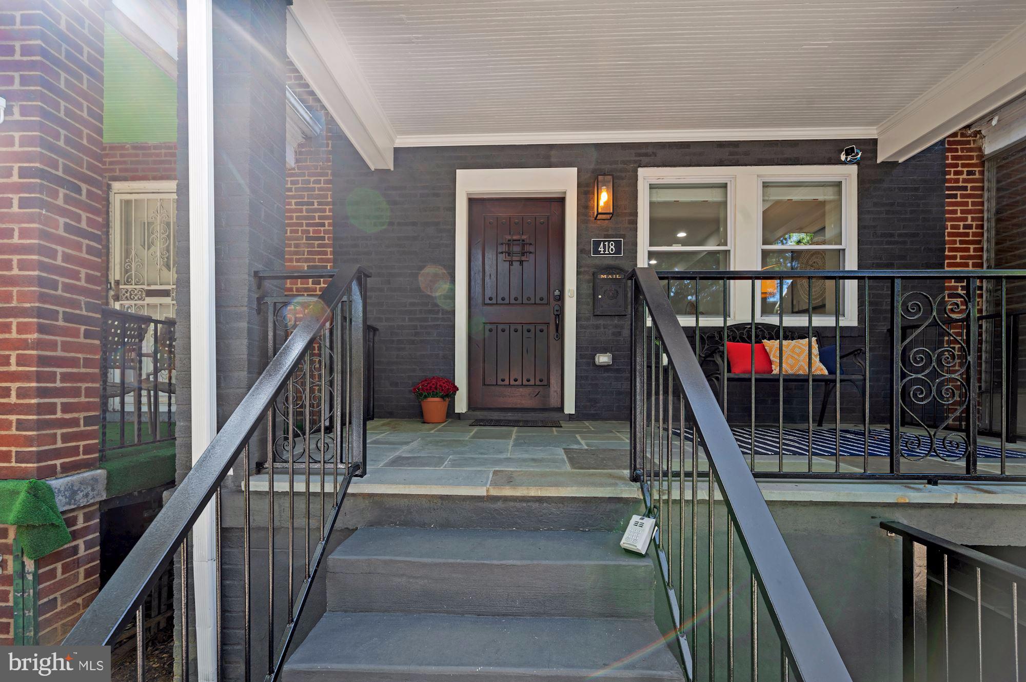 418 21st Street Northeast Washington, DC 20002 - Photo 2 of 48 a view of staircase with a floor to ceiling window and stairs