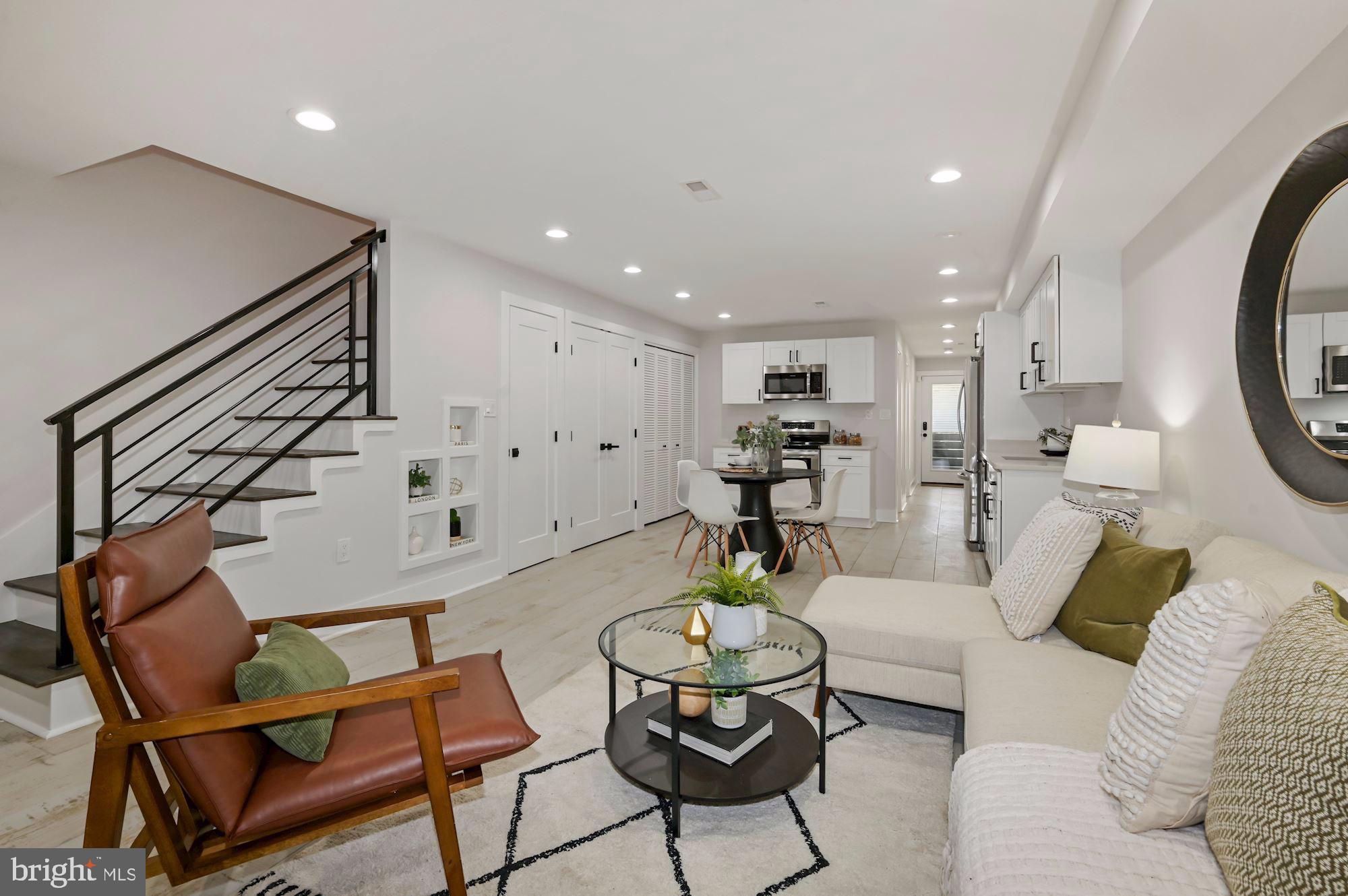 418 21st Street Northeast Washington, DC 20002 - Photo 28 of 48 a living room with furniture and a view of kitchen