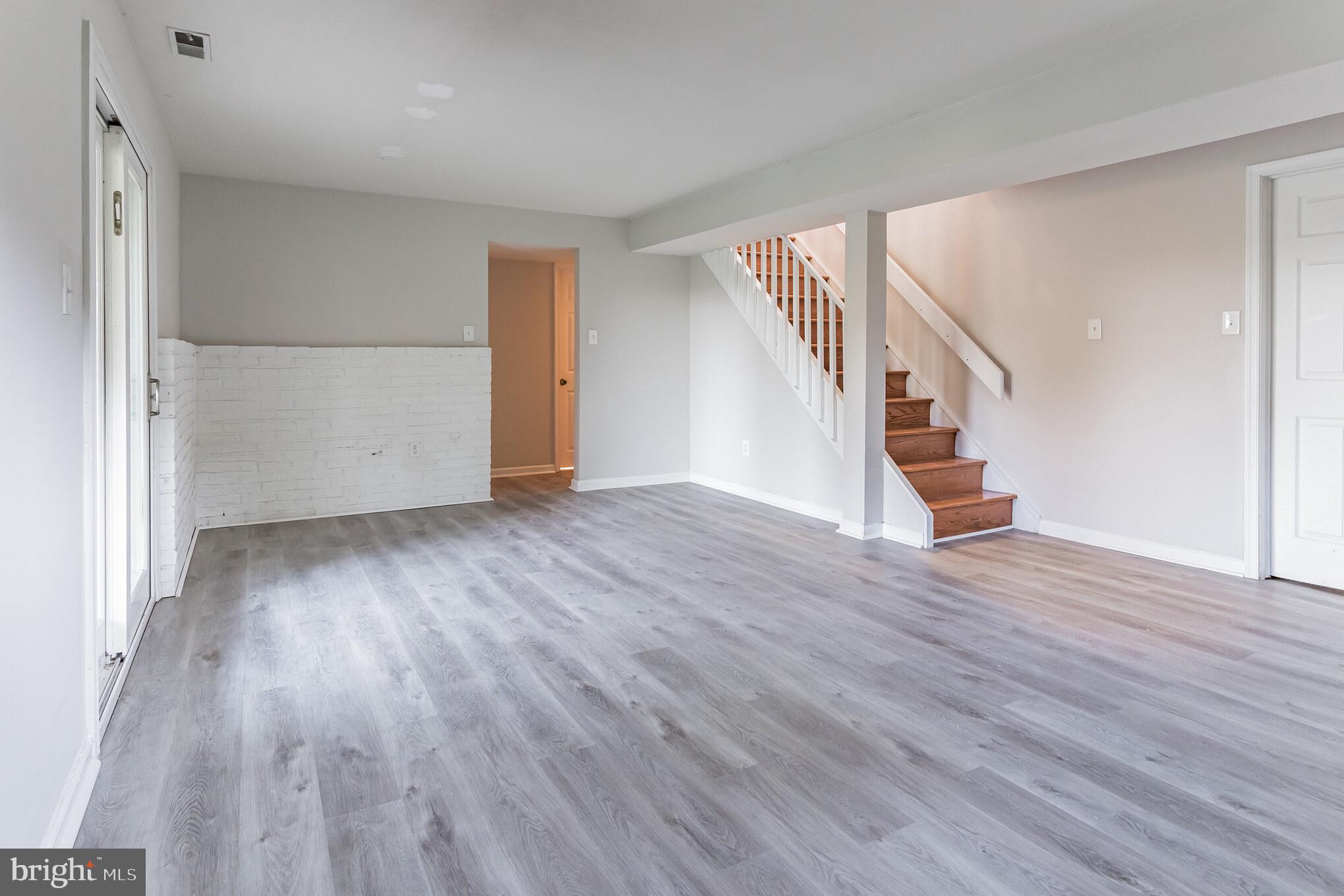 460 Park Road Downingtown, PA 19335 - Photo 19 of 39 Family Room access to Garage, Laundry & Rear Patio