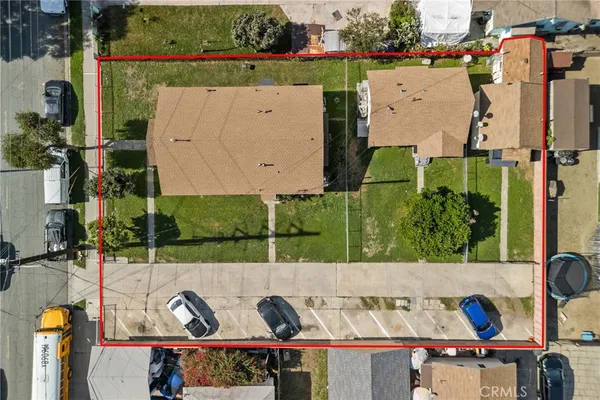 an aerial view of a house with swimming pool