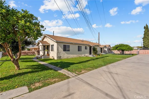 a view of house with outdoor space and street view