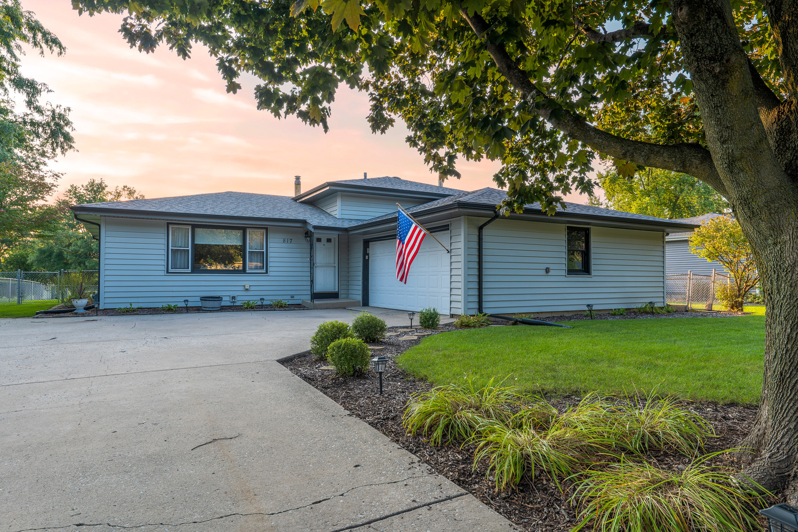 817 Southgate Road New Lenox, IL 60451 - Photo 1 of 30 a front view of a house with garden