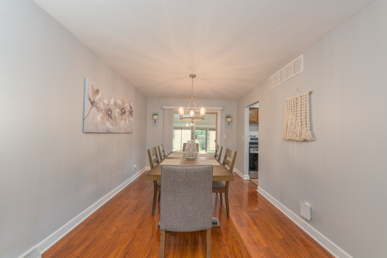 817 Southgate Road New Lenox, IL 60451 - Photo 11 of 30 a view of a dining room with furniture window and wooden floor
