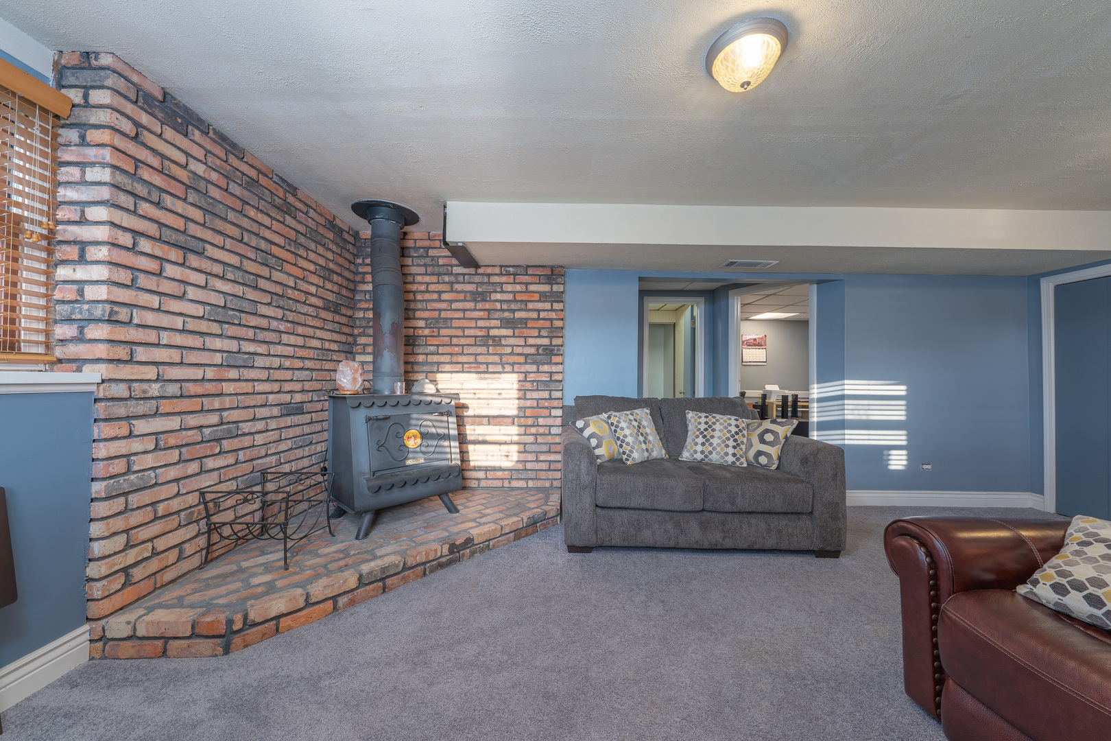 817 Southgate Road New Lenox, IL 60451 - Photo 12 of 30 a living room with furniture and a fireplace