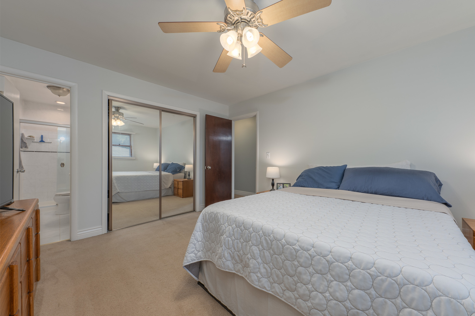 817 Southgate Road New Lenox, IL 60451 - Photo 16 of 30 a bedroom with a bed and a chandelier