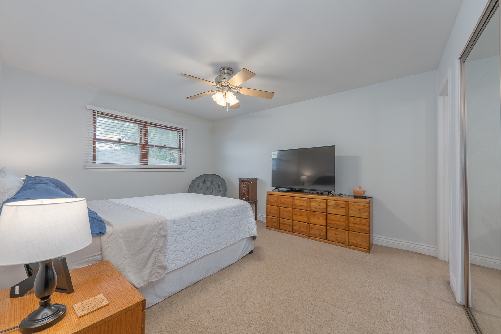 817 Southgate Road New Lenox, IL 60451 - Photo 18 of 30 a bedroom with a bed and a dresser in it