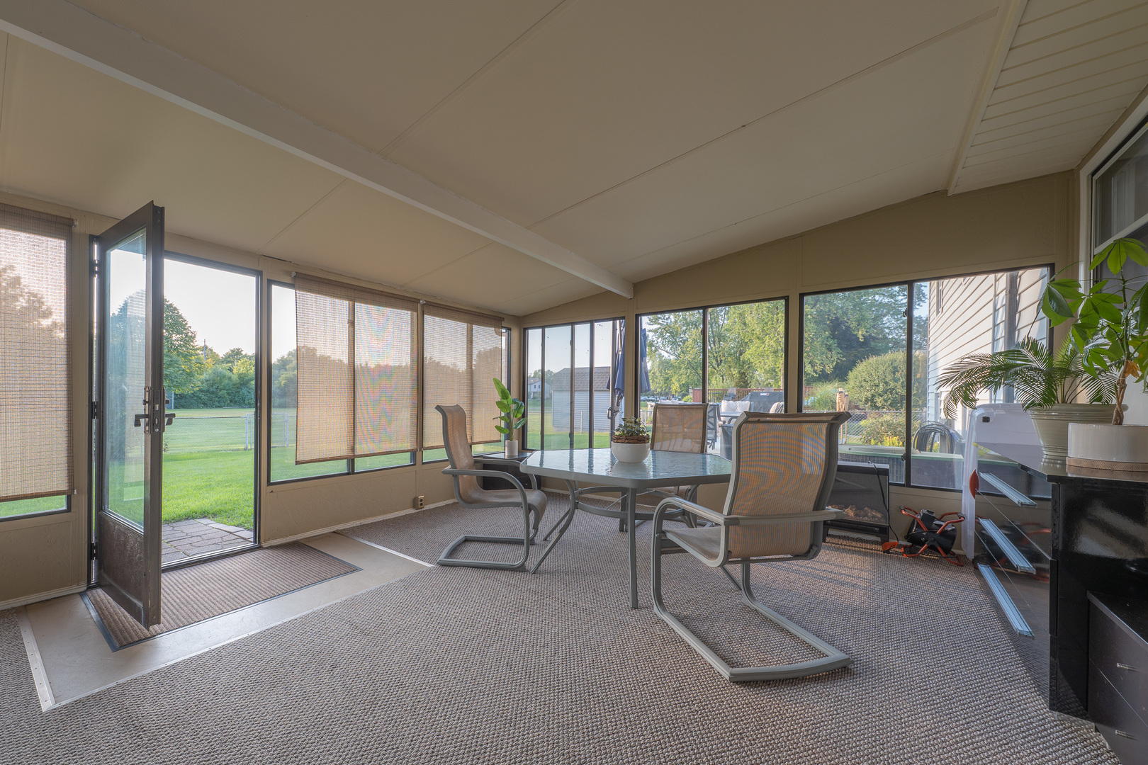 817 Southgate Road New Lenox, IL 60451 - Photo 23 of 30 a living room with furniture and a floor to ceiling window