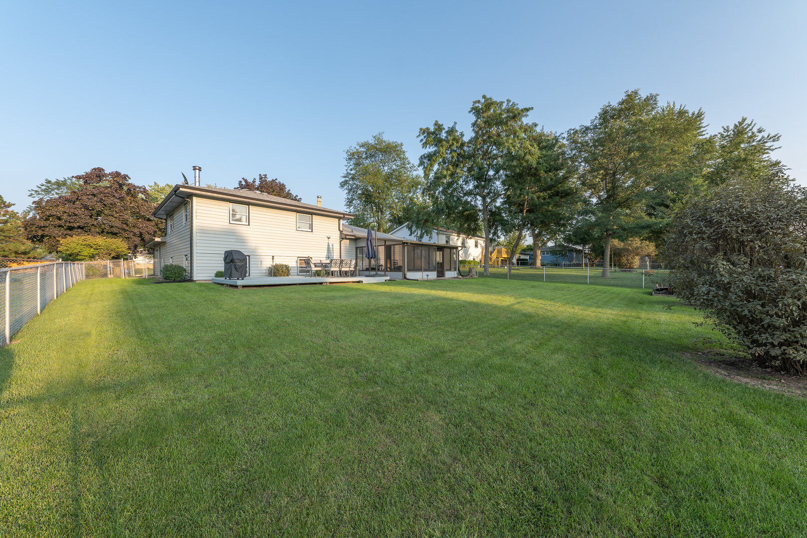 817 Southgate Road New Lenox, IL 60451 - Photo 27 of 30 a view of a house with a big yard and large trees