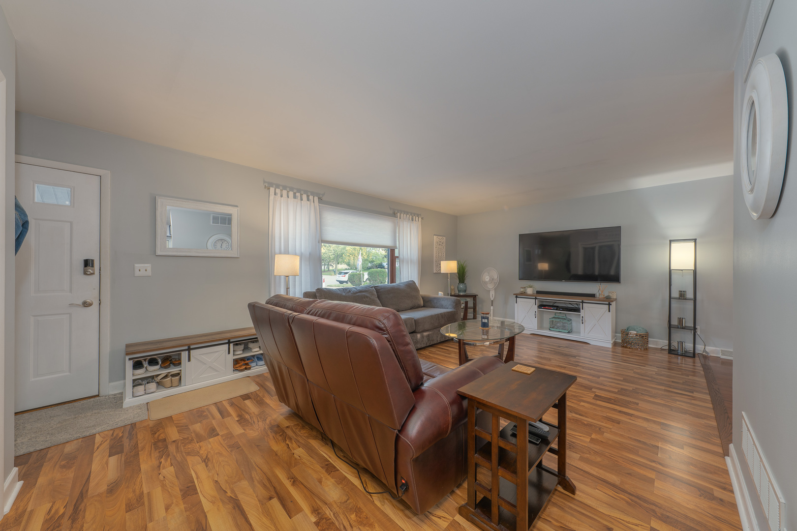 817 Southgate Road New Lenox, IL 60451 - Photo 6 of 30 a living room with furniture and a flat screen tv
