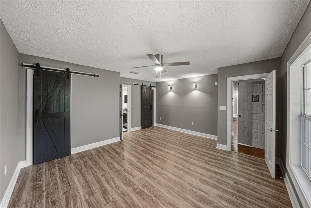 3505 Gallagher Road Dover, FL 33527 - Photo 67 of 100 a view of empty room with wooden floor