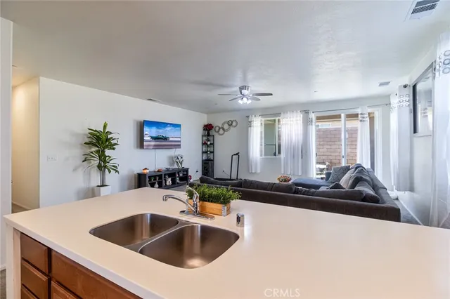 a kitchen with a sink and a window