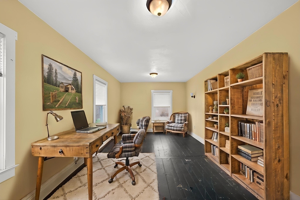 47 Singletary Avenue Sutton, MA 01590 - Photo 14 of 42 a view of a workspace with furniture and toys