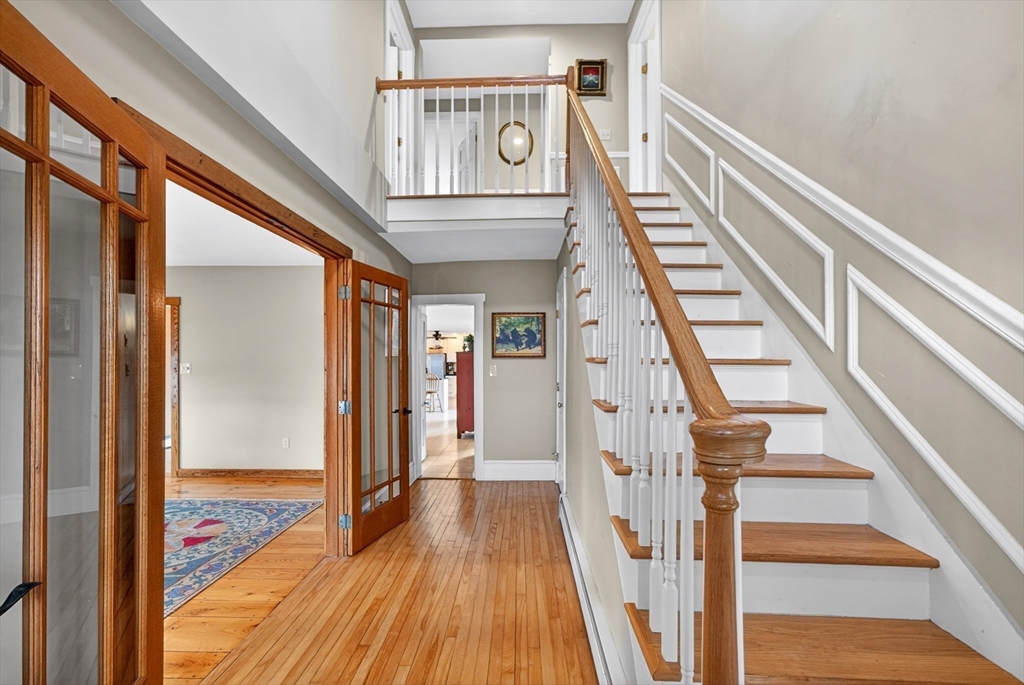47 Singletary Avenue Sutton, MA 01590 - Photo 19 of 42 a view of entryway with wooden floor