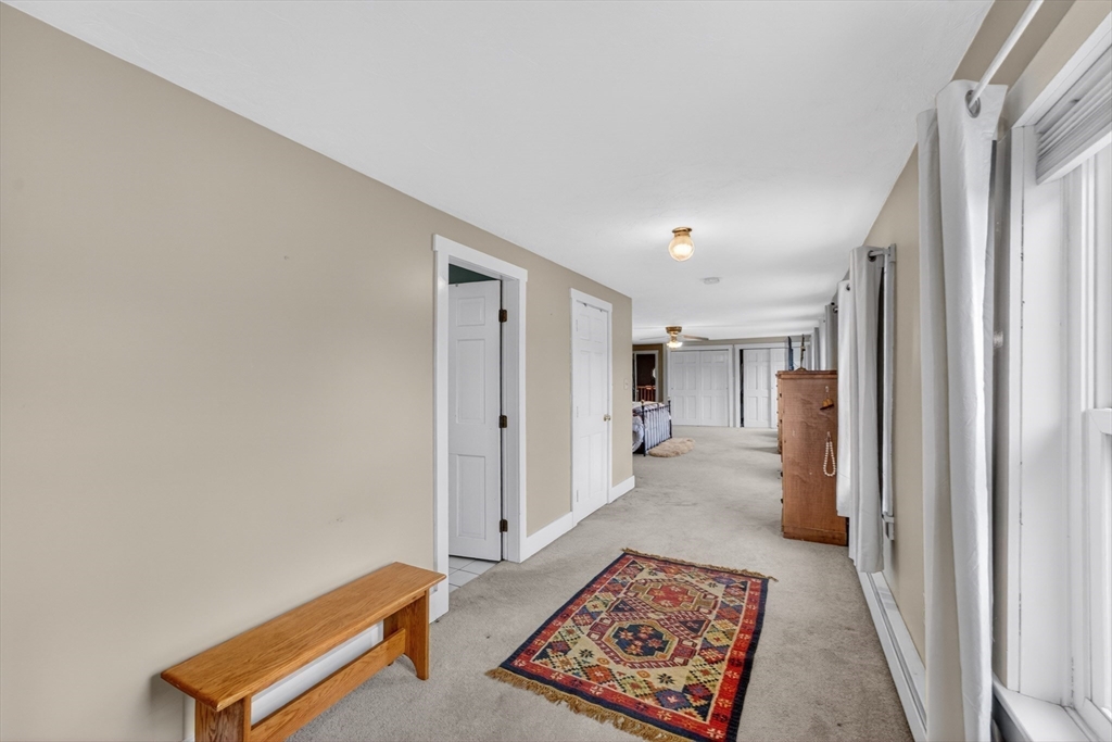 47 Singletary Avenue Sutton, MA 01590 - Photo 21 of 42 a view of room with furniture and wooden floor