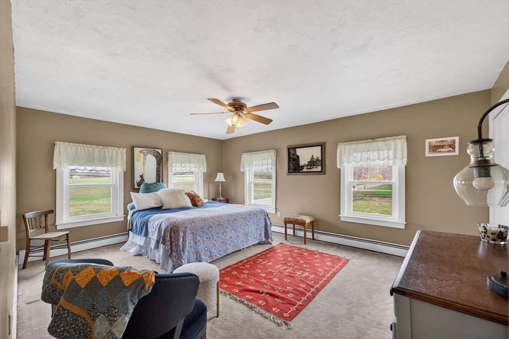 47 Singletary Avenue Sutton, MA 01590 - Photo 27 of 42 a bedroom with two beds and a large window