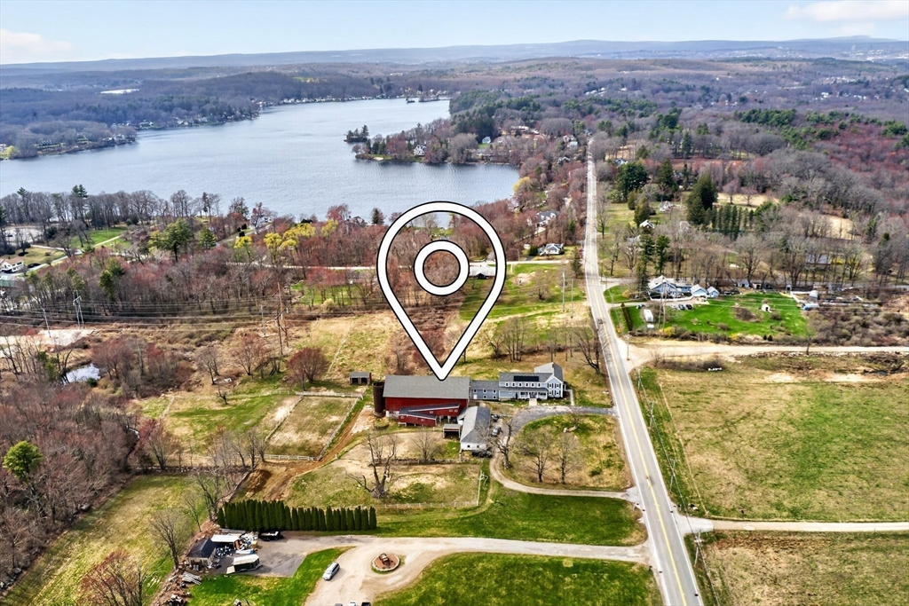 47 Singletary Avenue Sutton, MA 01590 - Photo 42 of 42 an aerial view of a house with a lake view