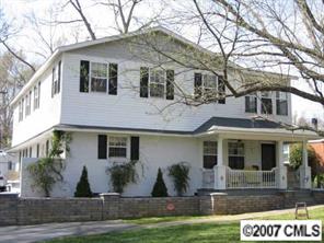 4322 Applegate Road Charlotte, NC 28209 - Photo 1 of 8 a front view of a house with a yard