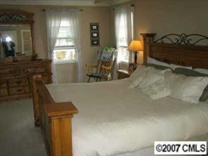 4322 Applegate Road Charlotte, NC 28209 - Photo 4 of 8 a view of a room with gym equipment